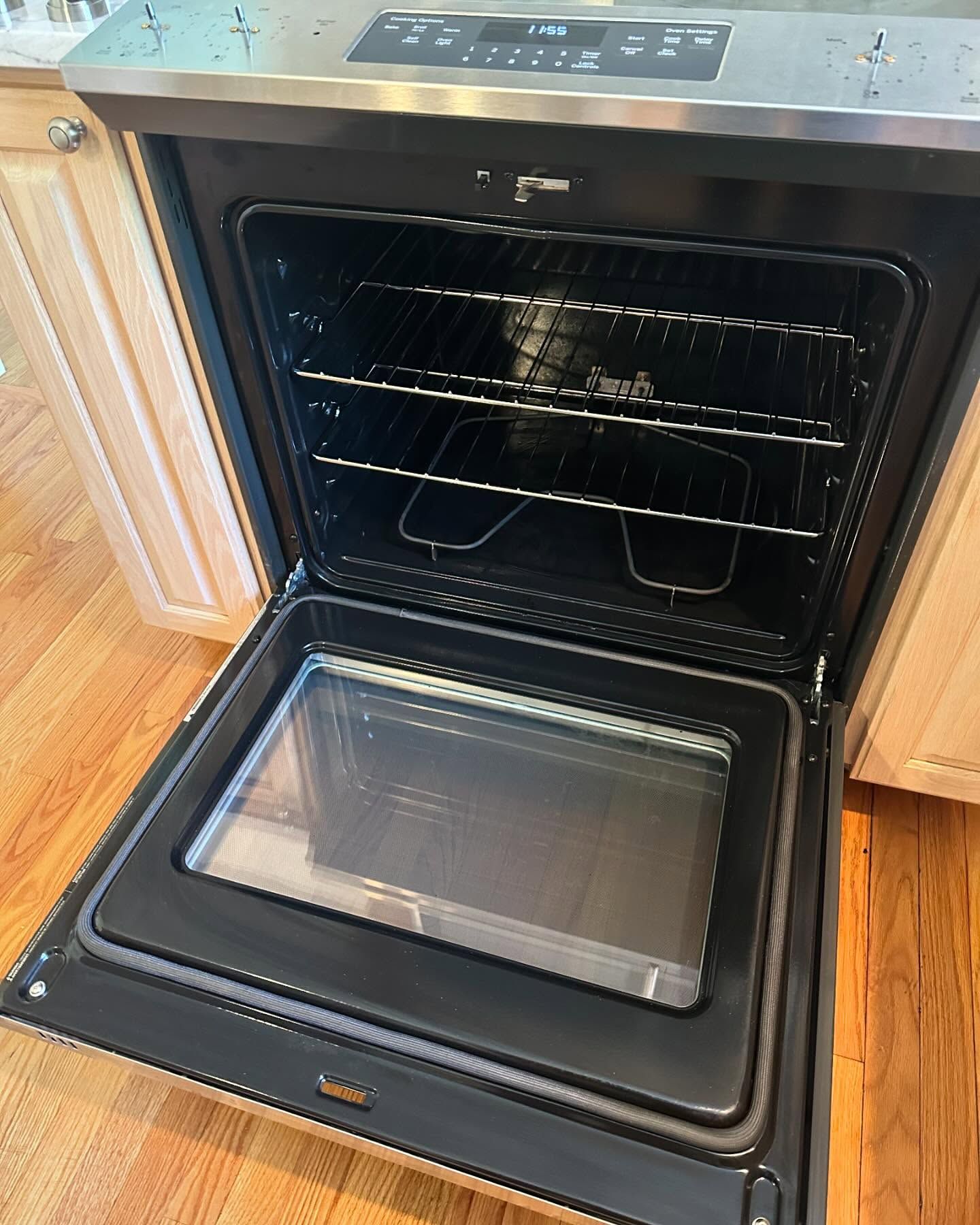 After: the same oven left spotless by Trinal Cleaning Services